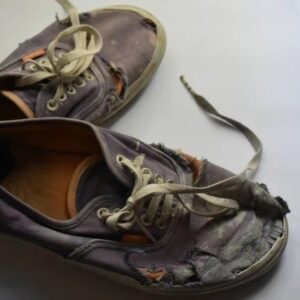 depositphotos_514612802-stock-photo-old-torn-and-dirty-sneakers